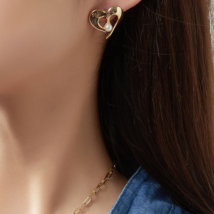 Boucle d'oreille tige Gertrudis