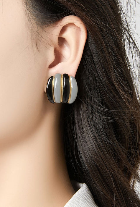 Boucles d'oreilles clip Zelma en acier inoxydable