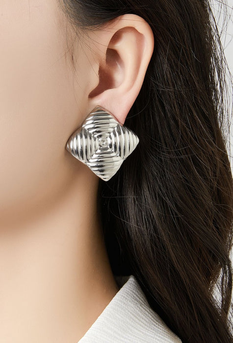 Boucles d'oreilles clip Zorione en acier inoxydable