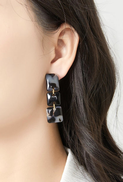 Boucles d'oreilles clip Neo en acier inoxydable