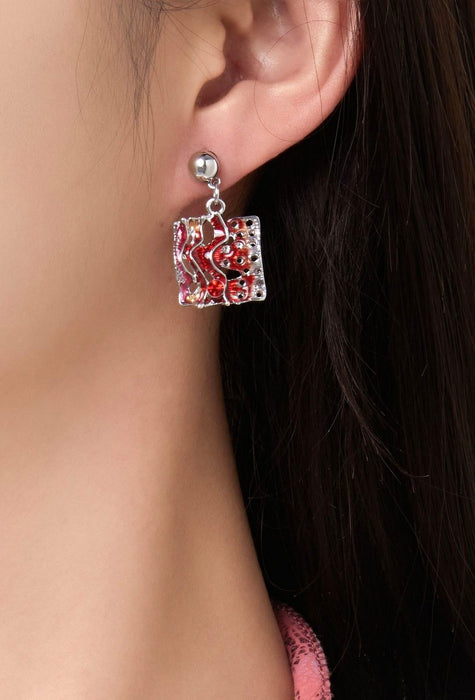 Boucles d’oreilles tige Tumpe