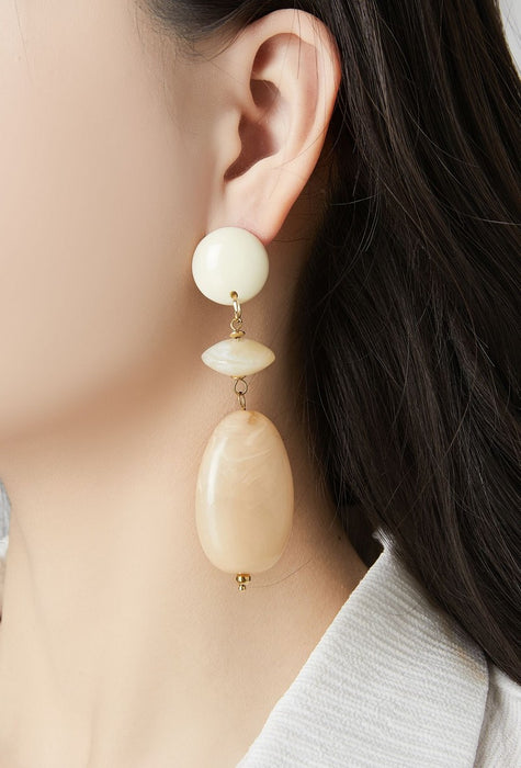 Boucles d'oreilles clip Uzima en acier inoxydable