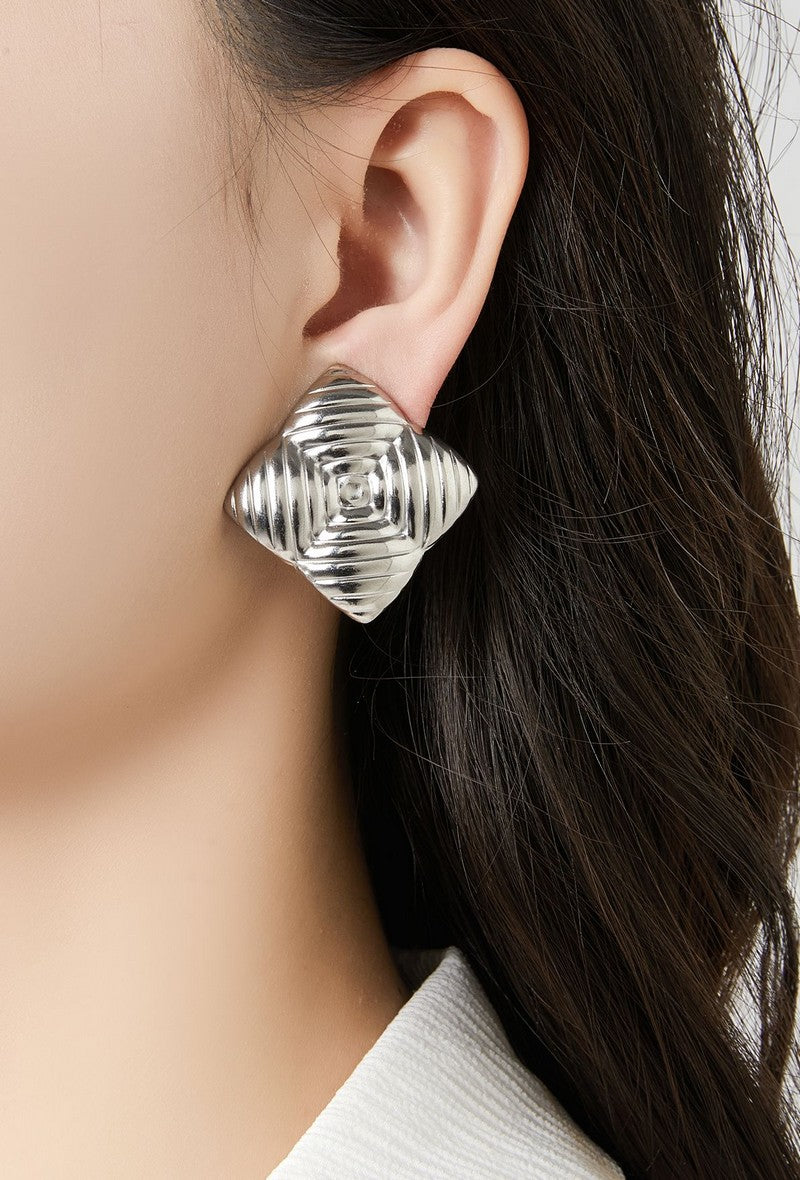 Boucles d'oreilles clip Zorione en acier inoxydable