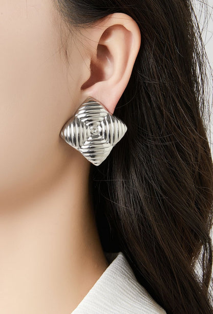 Boucles d'oreilles clip Zorione en acier inoxydable